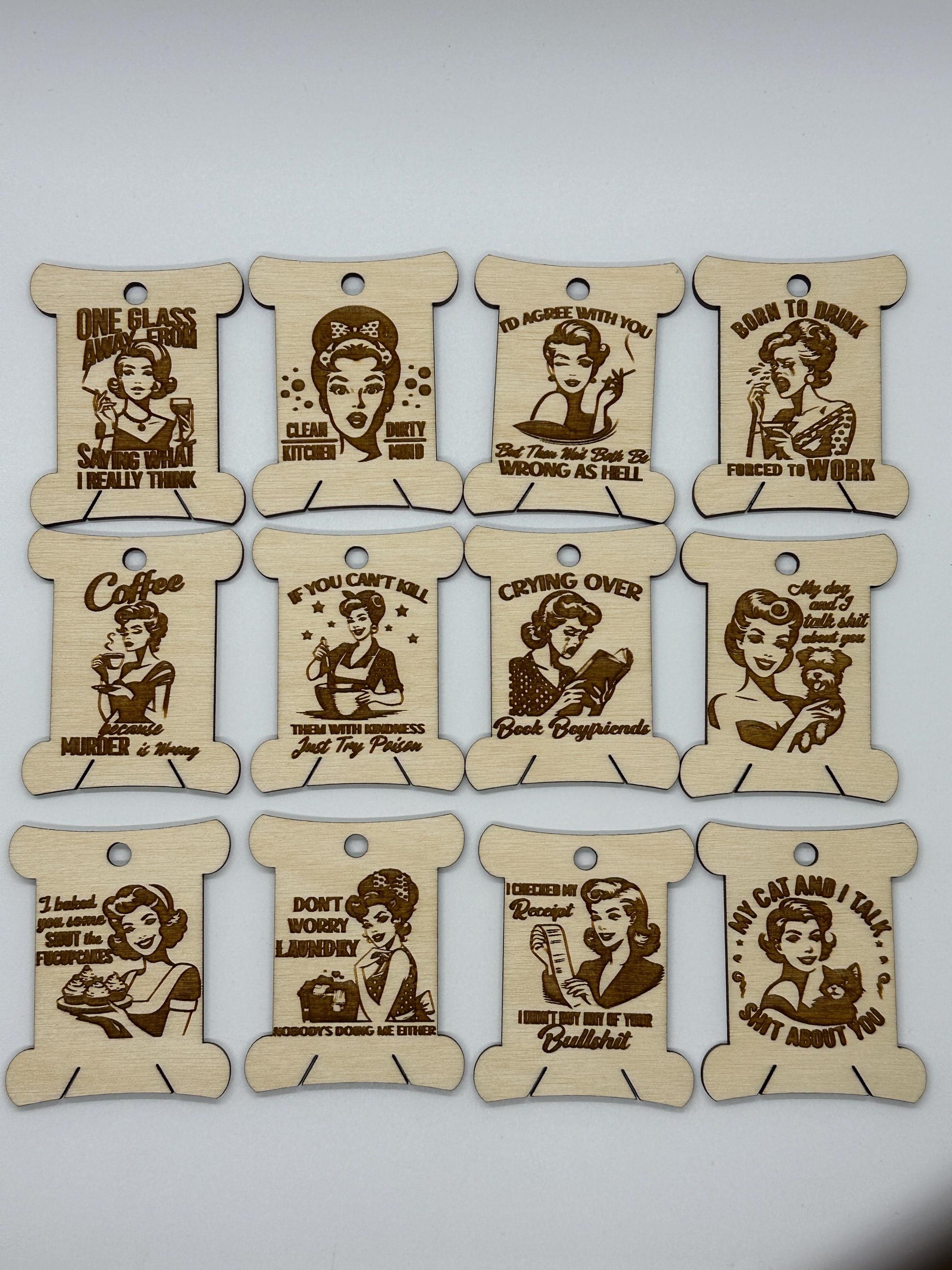 Set of wooden tags with engraved illustrations and text on a white background